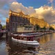 Pleasure Boat At Sunset In Amsterdam - VideoHive Item for Sale