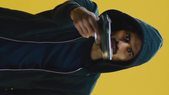 Young Man Threatening with Gun alt