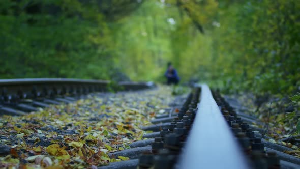 the Photographer Shoots on the Phone in the Tunnel of Love the Transfer of Focus From the Rail to alt