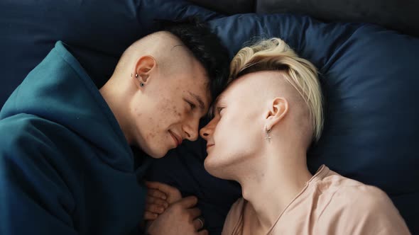 Gay Couple in the Bed Together Sensually Kissing and Bonding alt