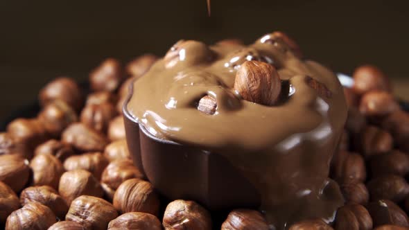 Pouring Hot Melted Chocolate and Hazelnut