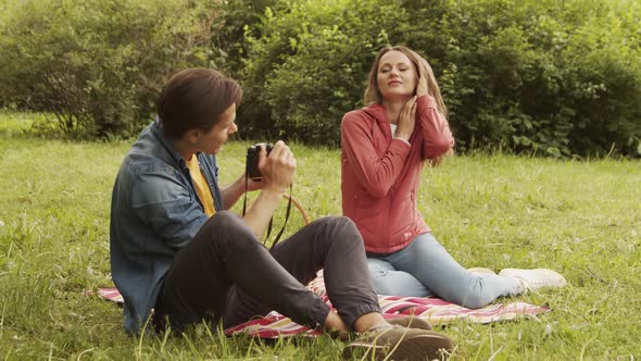 Workplace of freelance worker at home office. Young man works using computer. alt