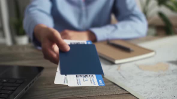 A White Young Woman Travel Agency Worker Issuing Air Tickets For Travel, Issuing Air Tickets alt