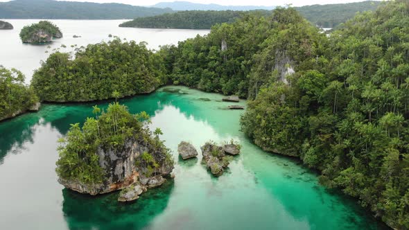 Triton Bay With Turquoise Sea And Green Tropical Trees In Kaimana Islands alt