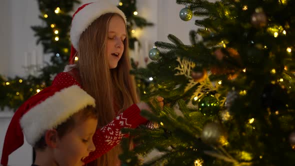 Cheerful Kids Preparing for Christmas Holidays alt