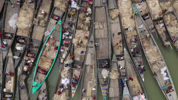 Aerial view of many Canoe docked along Rakti river, Bangladesh. alt