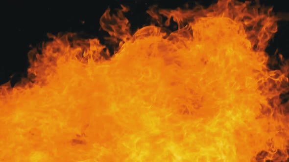 Fire Flames on a Black Background in Slow Motion Bonfire Burning at Night alt