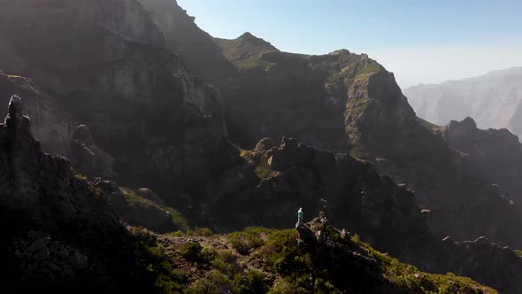 Drone Orbit Around Man Hiker Standing on Cliff at Madeira Island, Portugal