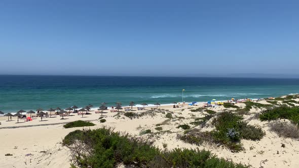 The best beach with yellow sand and blue ocean at Pego (nearby Carvalhal) in Alentejo, Portugal alt