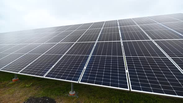 Timelapse on Solar Power Plant with clouds moving above the solar panels