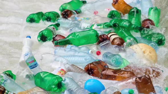 Plastic waste drifting in polluted water is an environmental problem. alt