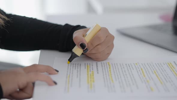 Close Up Shot of a Student of Colombian Universitary Highlighting Important Words and Sentences of alt