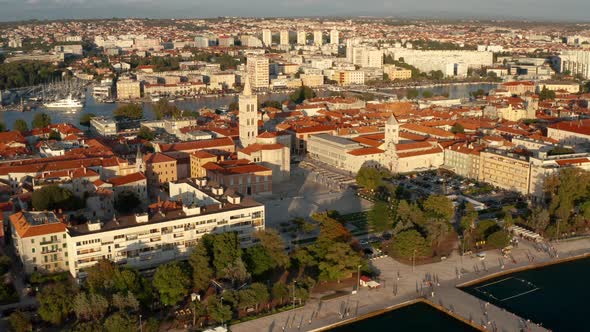 Riva Zadar Promenade And Park With Zadar City Community At Sunset In Croatia. - aerial alt