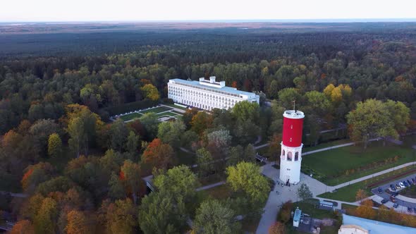 Kemeri Water Tower With Latvian Flag in the Kemeri Resort Park in Jurmala, Latvia. alt