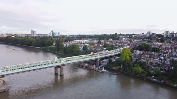 Drone View of the River Thames From the Fulham Railway Bridge in London