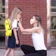 Happy Little Caucasian Blonde Girl Seven Years Old in Uniform with Yellow Backpack Going Back to - VideoHive Item for Sale