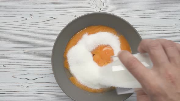 Add Sugar To Yolks and Mix