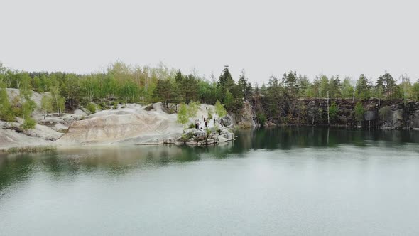 Aerial View of Lake Pine Forest on the Background alt