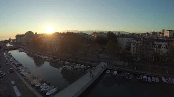 Aerial view of a bridge at sunset alt