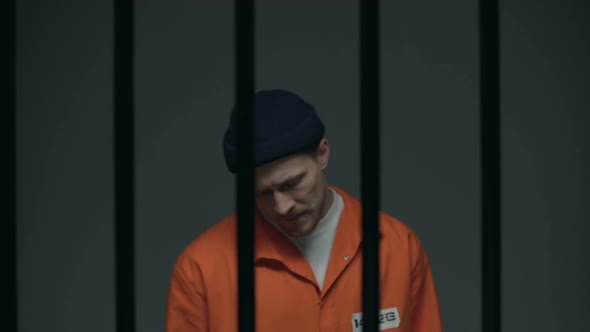 Arrogant Imprisoned Male With Toothpick Showing Bad Manners, Splitting on Floor alt