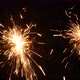Handheld sparkle firework isolated on black. New year concept - VideoHive Item for Sale