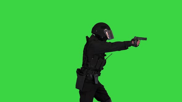 Special Police Unit Walking in and Shooting From Hand Gun on a Green Screen Chroma Key alt