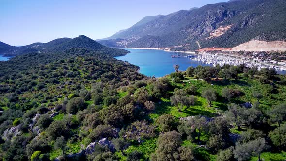 The top view from the drone of Kas resorts, bay, yahts, city in Mugla in Turkey alt