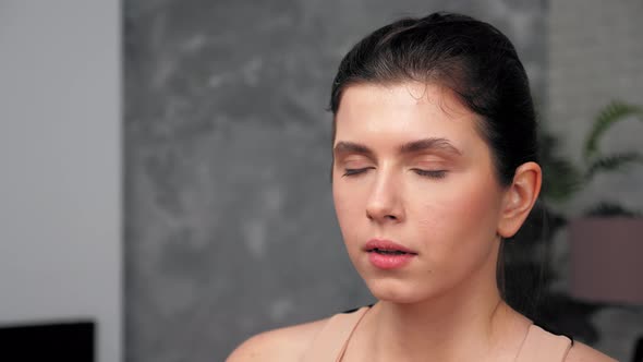 Close Up Athletic Muscular Tired Woman Looking Camera at Home in Living Room alt
