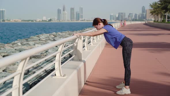 Girl Does Stretching Near Sea