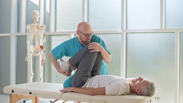 The Patient Uses Physical Therapy To Recover From Surgery and Increase Mobility. alt