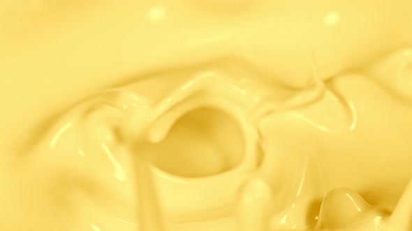 Super Slow Motion Shot of Pouring and Splashing Banana Milk at 1000Fps alt