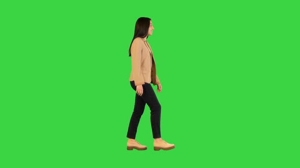 Indian Girl Walking and Smiling on a Green Screen Chroma Key
