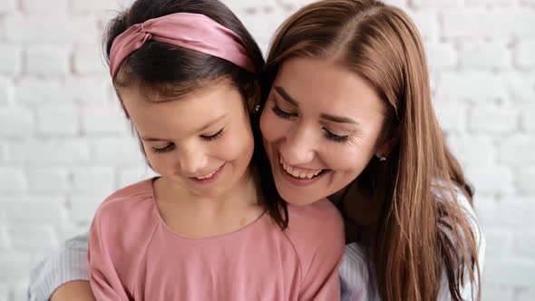 The Girls' Hands are Sitting on the Ester alt