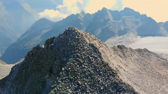 Flying over the Glacier of Adamello Mountains alt