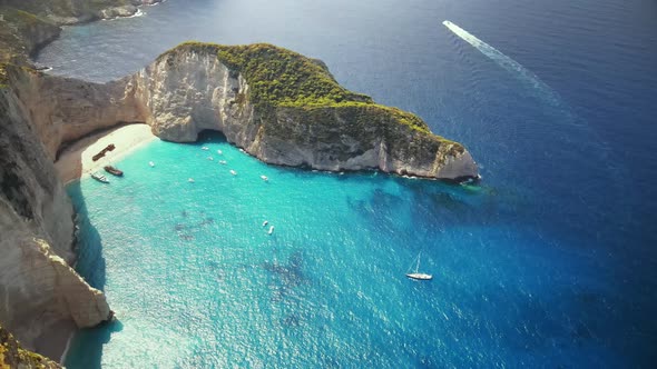 Aerial drone view of the Navagio beach on the Ionian Sea coast of Zakynthos, Greece alt