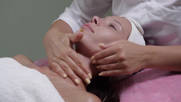 Correction of the Neck Area By Buccal Massage for a Brunette Girl alt