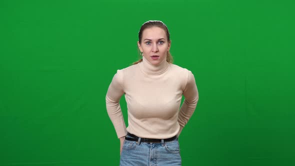 Portrait of Anxious Woman Searching for Wallet Finding in Pocket and Smiling alt