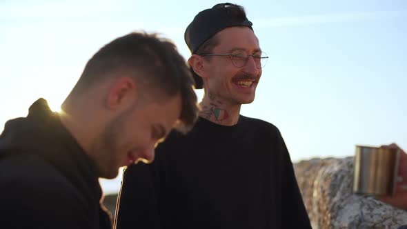 Young People Enjoying Time Together Smiling Feeling Happy in Clear Bright Morning Slow Motion alt