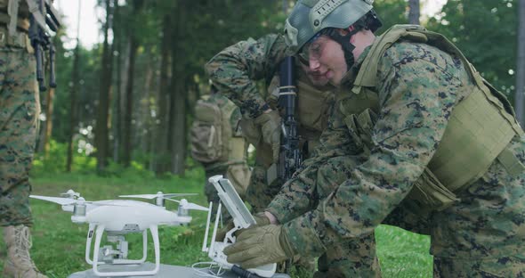 Soldiers Prepare for Deployment of Drone and Preparing for Military Action alt