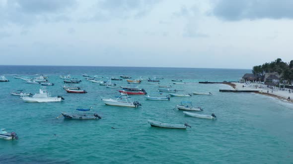Boats Moored in the Turquoise Water of Caribbean Sea alt