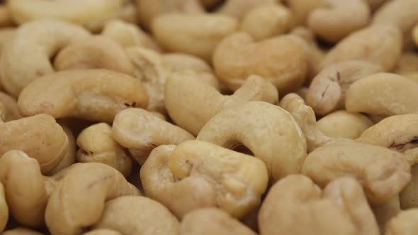 raw cashew nuts close up. Healthy Food. Sliding shot. 4K UHD video alt