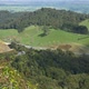 View From Kaimai Range Of Vehicles Passing By At The State Highway 29 In New Zealand With Lush Green - VideoHive Item for Sale