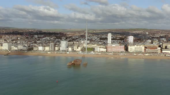 Brighton Beach in the UK with the Remains of the West Pier in the Summer alt