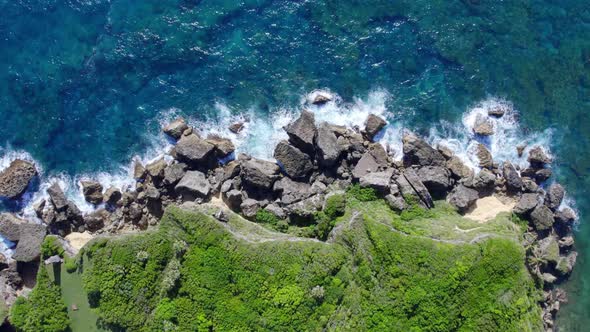 Waves crashing on rocks