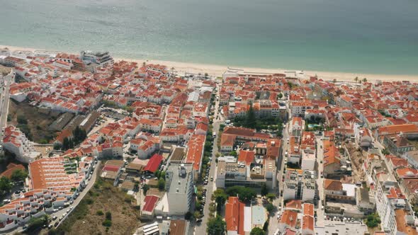 Aerial View of a Luxury Mansions on the Edge of a Shore alt