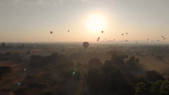 Aerial view of hot balloons in the Old Bagan temple site. alt