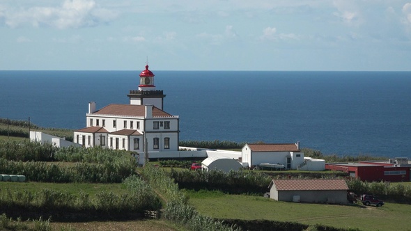 Environment. Azores. Lighthouse on the ocean. Lighthouse at the East of Sao Miguel island. Portugal. alt