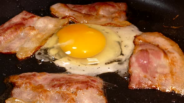 Breakfast of Bacon and Fried Egg in a Pan