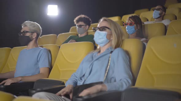 Group of People Watching 3d Film During Covid-19 Pandemic Lockdown in Movie Theater. Group of alt