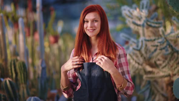 Awesome Redhead Gardener Lady with a Large Smile alt